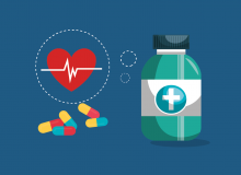 A pill bottle, pills and a healthy heart symbol 